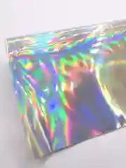 Серебряный кожзам голография 20*27 см