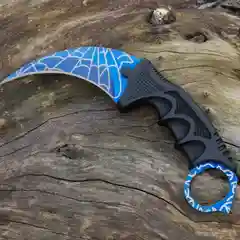 Синий нож керамбит из игры CS Go в паутине