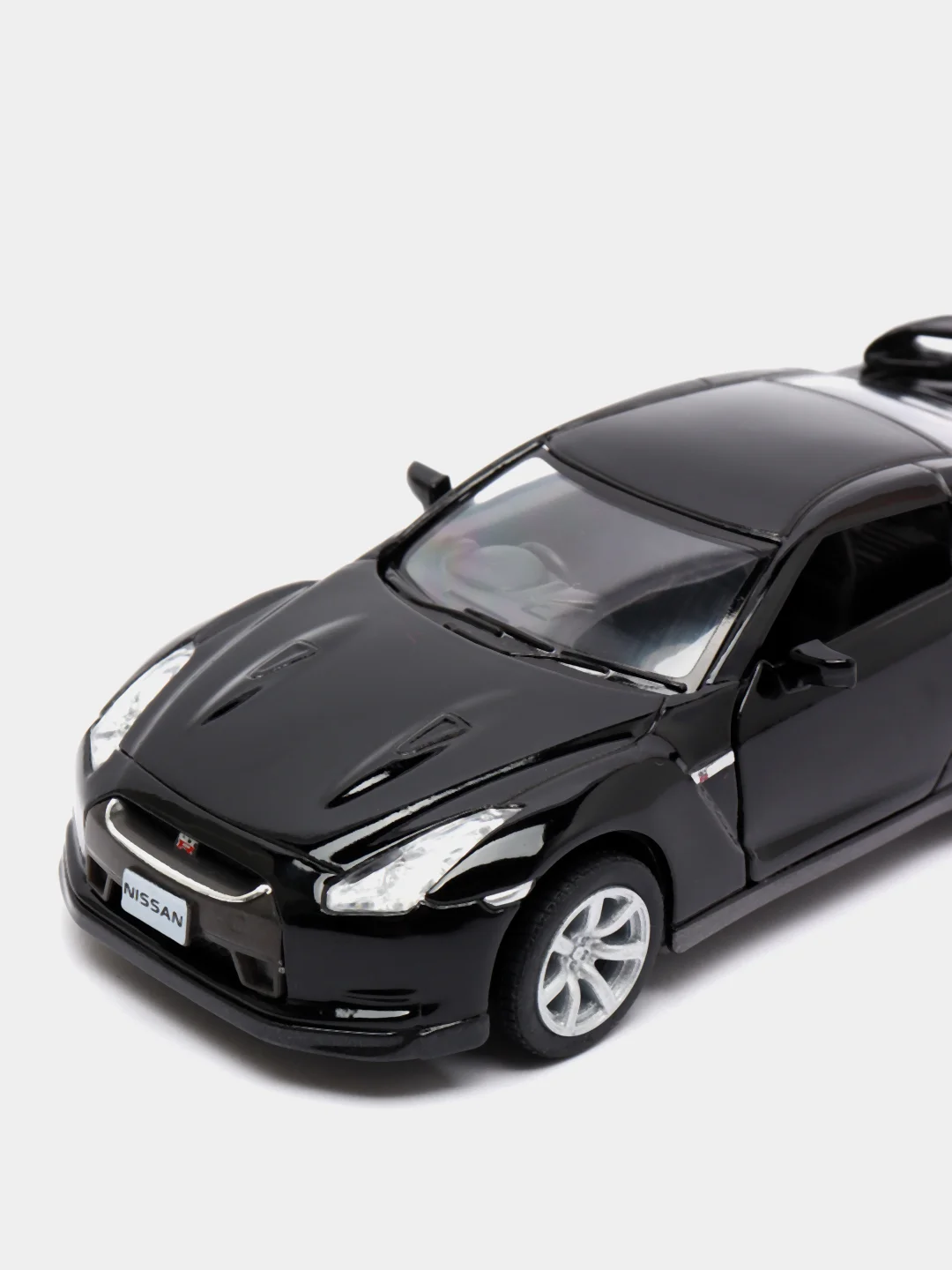 Черный металлическая машинка 2009 Nissan GT-R R35 KT5340D