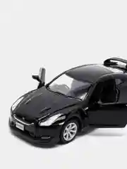 Черный металлическая машинка 2009 Nissan GT-R R35 KT5340D