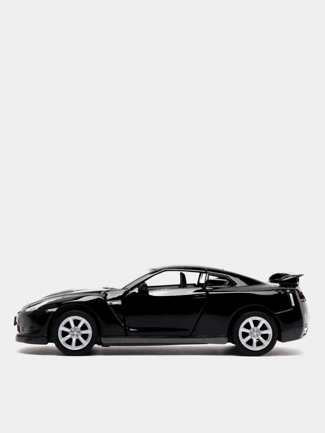 Черный металлическая машинка 2009 Nissan GT-R R35 KT5340D
