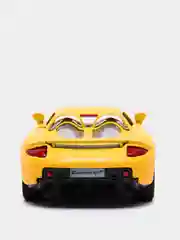 Желтый металлическая машинка 1:32 Porsche Carrera GT KT5081D