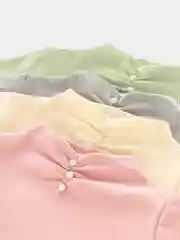 Водолазка для девочки с жемчугом