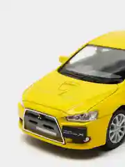Желтый металлическая машинка 2008 Mitsubishi Lancer Evolution X KT5329D