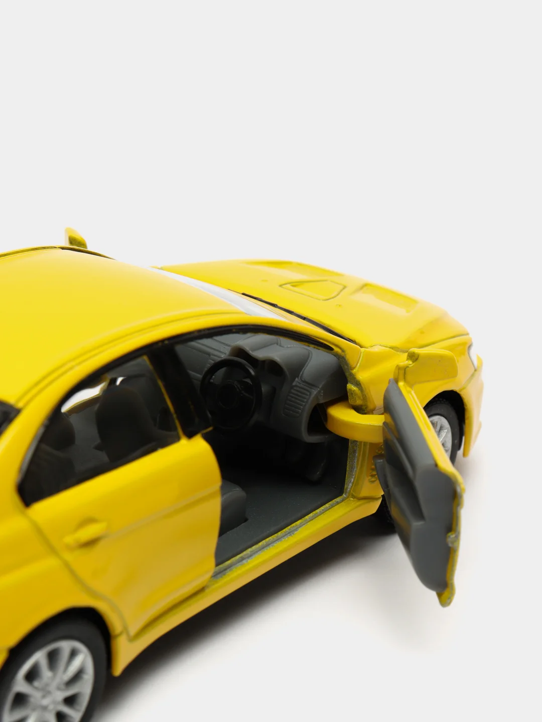 Желтый металлическая машинка 2008 Mitsubishi Lancer Evolution X KT5329D