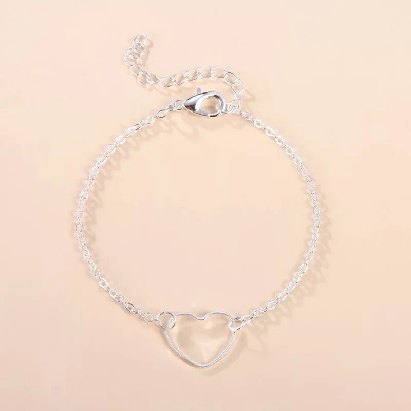 Серебряный браслет женский с сердцем