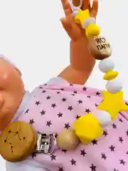 Желтый держатель соски знак созвездия "Весы"