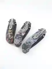Красный нож туристический раскладной BOKER череп волк орел