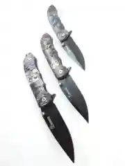 Красный нож туристический раскладной BOKER череп волк орел