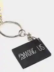 Желтый брелок Амонг ас Герой/Among us,фигурный, светится в темноте