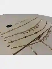 Золотой чокер из 4 цепочек золотистого цвета