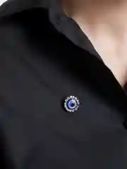 Серебряный брошь от сглаза