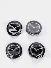 Черный колпачок-заглушка на литой диск Mazda (Мазда) 3BK, 4 штуки, 2003-2009