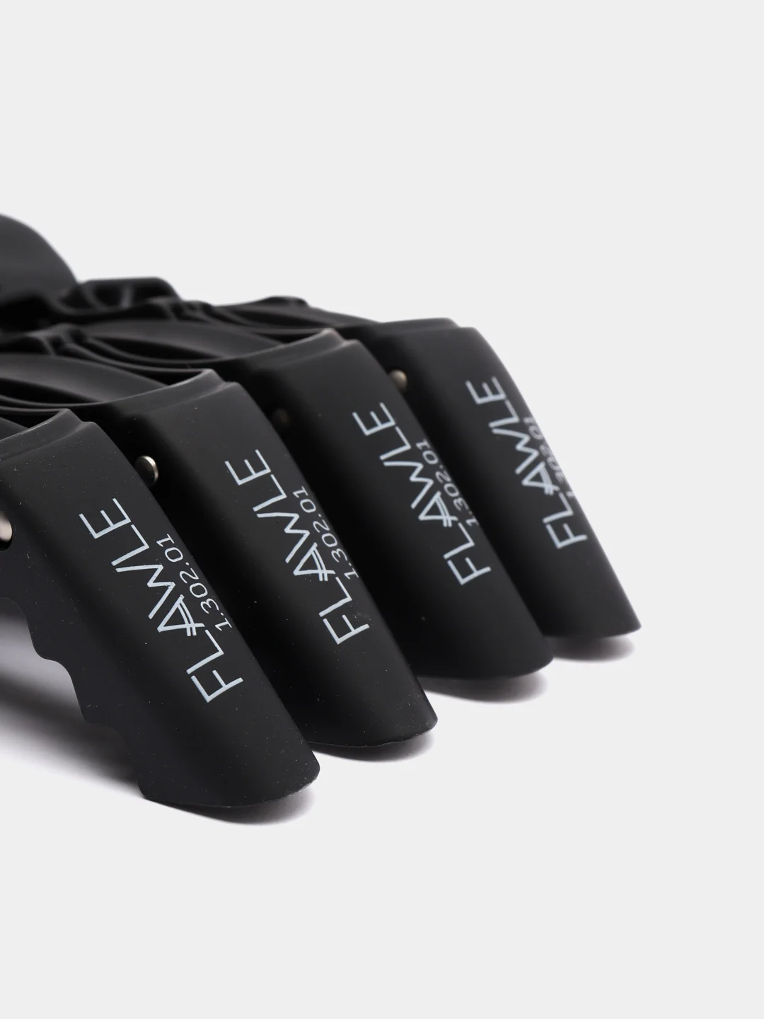 Черный зажим-трансформер для волос Flawle Rubberized 1.302