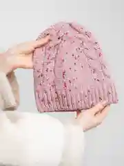 Пастельно-коралловый яркая женская шапка из фантазийной пряжи "Фанта"
