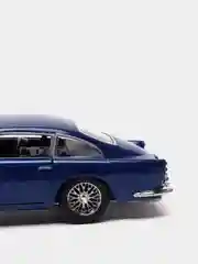 Синий машинка Aston Martin DB5 металлическая, 1:38 KT5406D