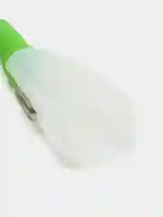 Зеленый овощечистка с контейнером