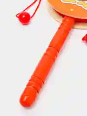 Рыжий игрушечный деревянный барабан