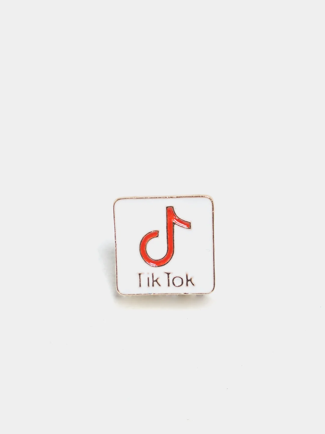 Белый брошь "TIK-TOK"