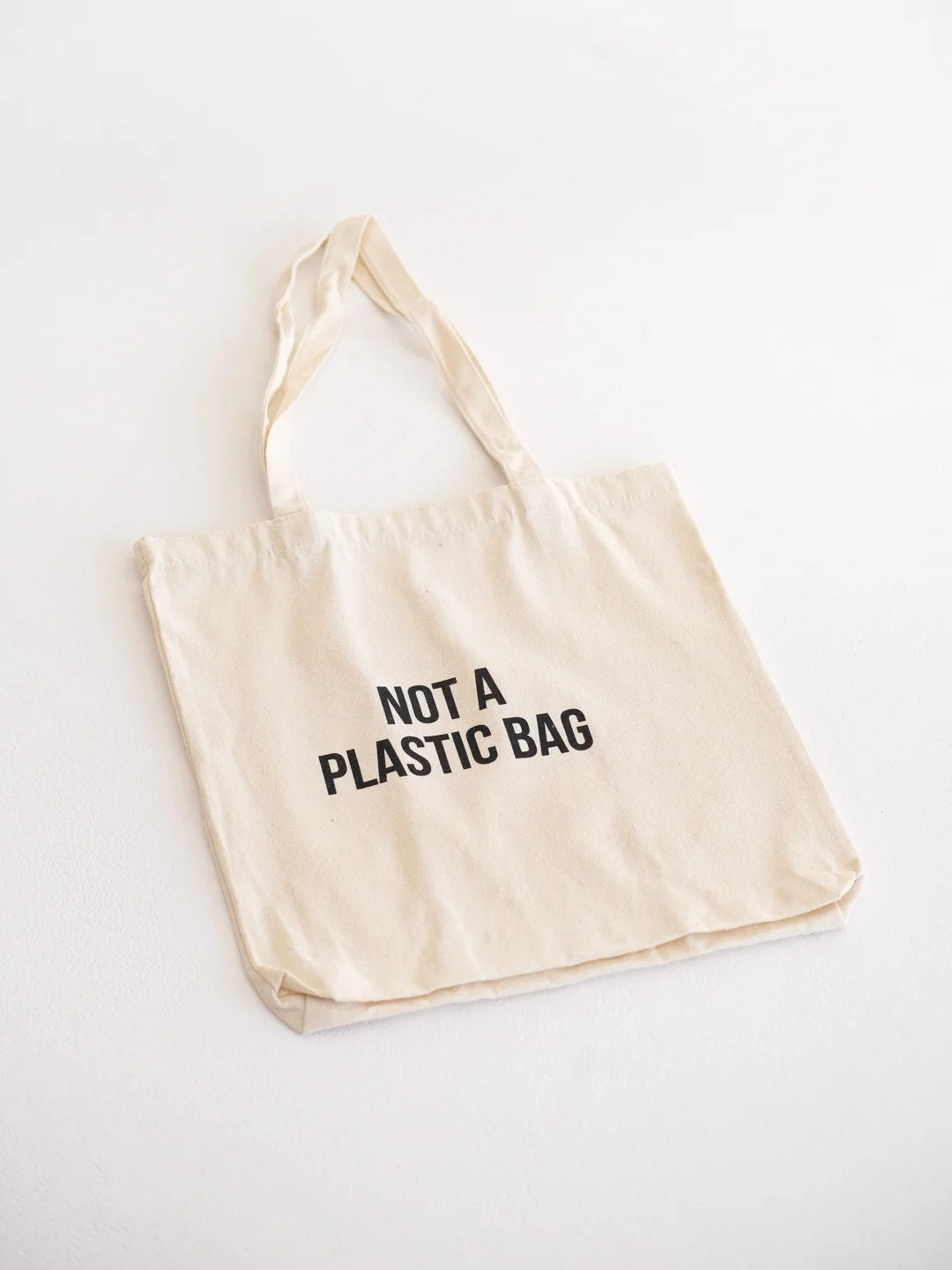 Эко сумка-шоппер, хлопковая, черная, с принтом "Not a plasticbag", 100% хлопок, унисекс