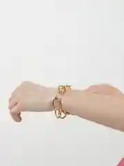Золотой женский браслет из цепей
