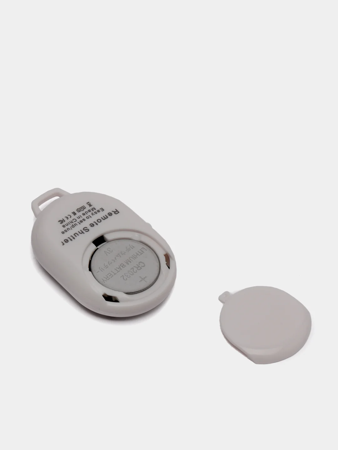 Белый bluetooth-пульт для штативов и телефонов