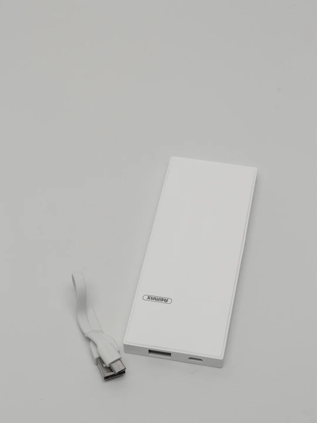 Белый мобильный аккумулятор (PowerBank) REMAX Thoway RPP-54 5000 mAh