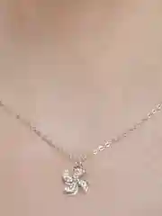 Серебряный цепочка с кулоном цветок с крутящимися лепестками