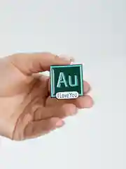 Металлический значок Adobe