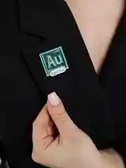 Металлический значок Adobe