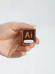 Металлический значок Adobe