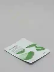 Зеленый тканевая маска для лица с природными компонентами, увлажняющая