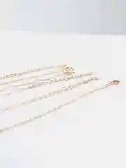 Золотой набор из трех цепочек с подвесками