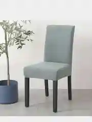 Зеленый чехол на стул