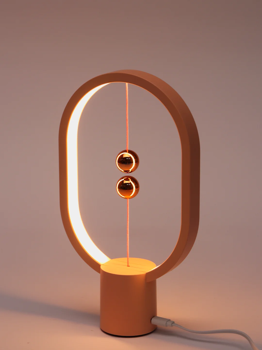 Розовый настольный светильник с магнитами Levitation Lamp