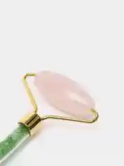 Розовый ролик - массажер для лица