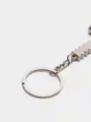 Белый брелок "Инструмент" металлический