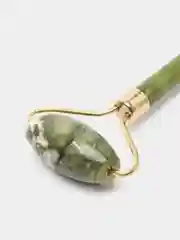 Белый роликовый массажер для лица