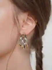 Серьги-кольца с искажением переплетения из металла женские