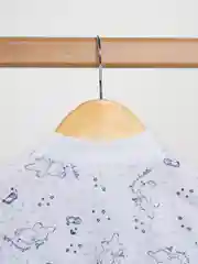 Белый комбинезон для новорожденных