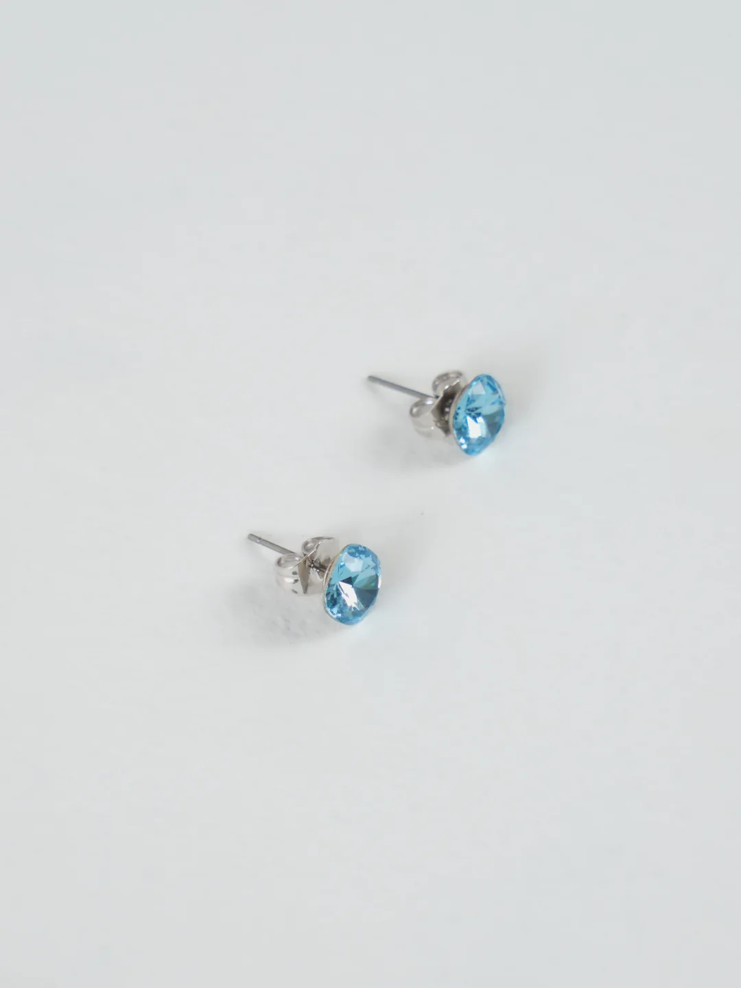 Морской серьги-гвоздики с крупным камнем Swarovski