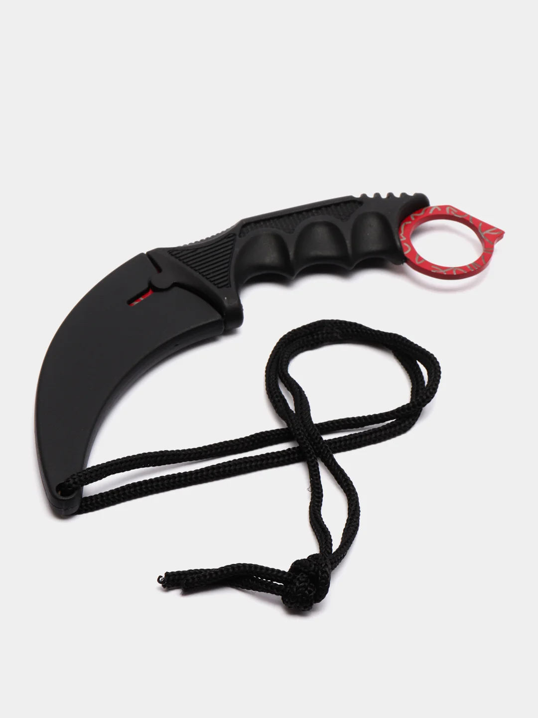Красный нож керамбит из игры CS Go в паутине