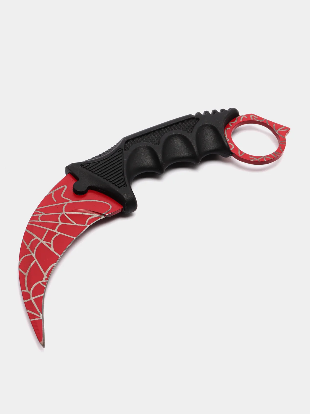 Красный нож керамбит из игры CS Go в паутине