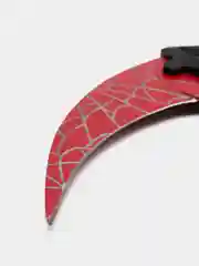 Красный нож керамбит из игры CS Go в паутине