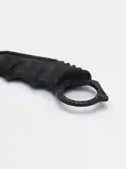 Черный нож керамбит из игры CS Go в паутине