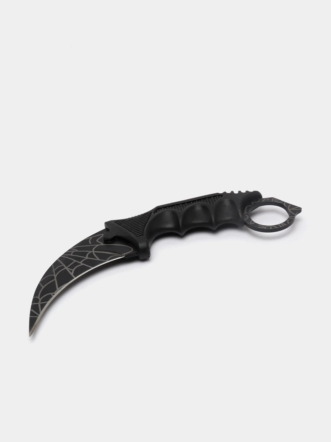 Черный нож керамбит из игры CS Go в паутине