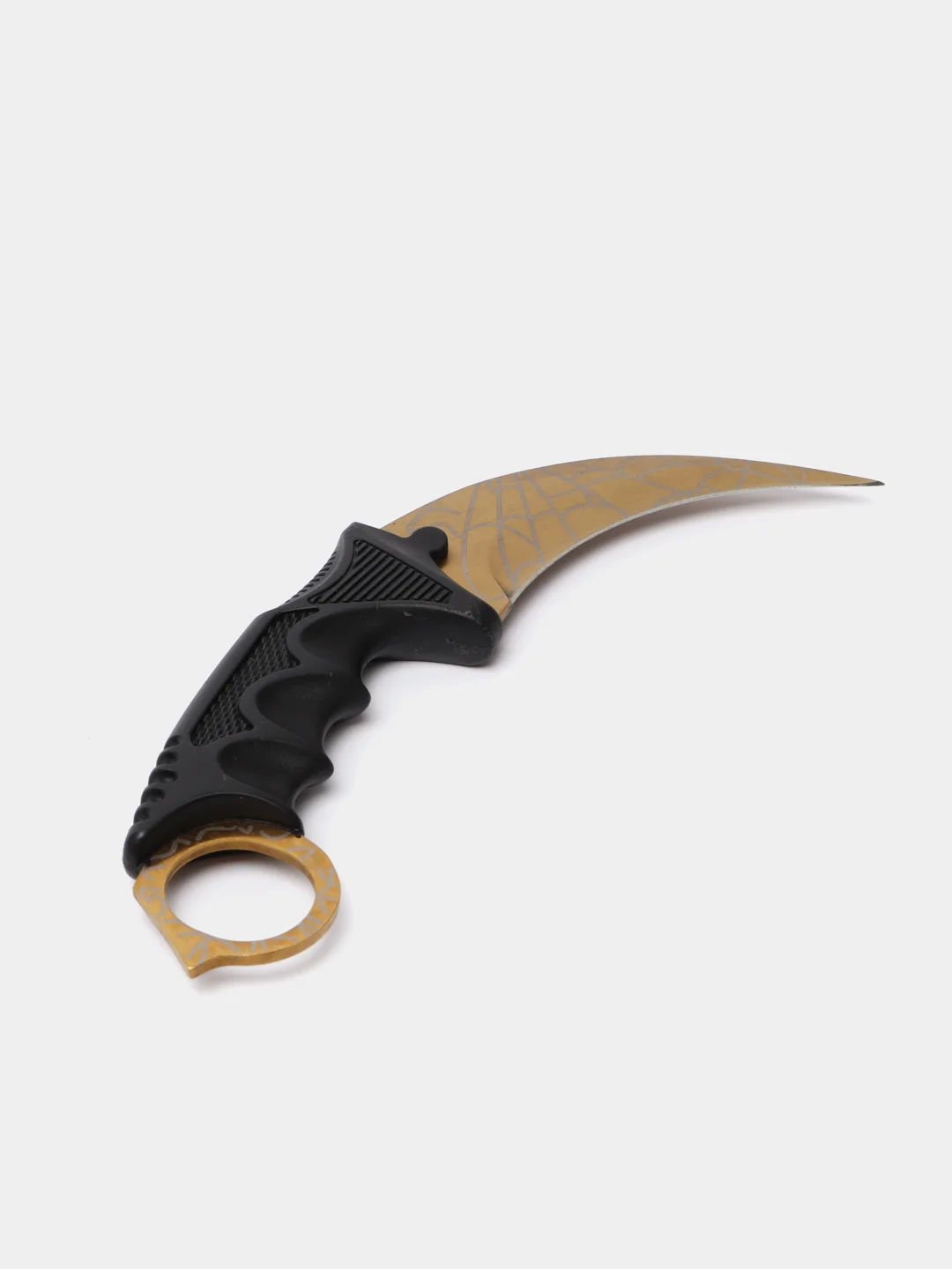 Золотой нож керамбит из игры CS Go в паутине