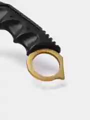 Золотой нож керамбит из игры CS Go в паутине