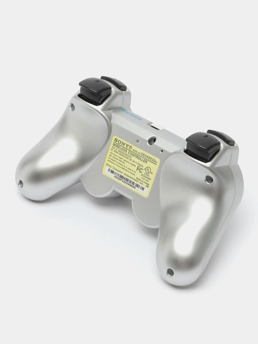 Серебряный беспроводной геймпад для PS3
