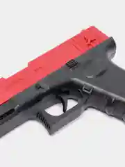 Красный пистолет игрушечный Глок, перезаряжаемый Glock, с гильзами и мягкими EVA пулями